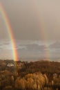 Double rainbow against the sunset sky. Leprechaun at the end of the rainbow. Rainbow as a concept of fantastic money Royalty Free Stock Photo