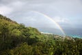 Double rainbow, blue ocean and lush jungle in Seychelles