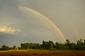 Double Rainbow Through Clouds and Mist