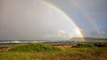 Double rainbow facing the Caribbean Sea from Guadeloupe Royalty Free Stock Photo
