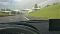 Double rainbow on freeway