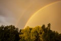 Double rainbow after a heavy summer rain in a Siberian forest