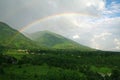 Double rainbow on lush green himalayan valley