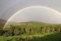 Double rainbow in the mountains after rain Royalty Free Stock Photo