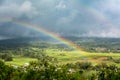 Double Rainbow Over Countryside with a Storm background. Ruteng, Manggarai Regency, Flores, East Nusa Tenggara, Indonesia Royalty Free Stock Photo