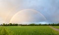 Double rainbow over the fields, on the outskirts of hohenkirchen village, panorama landscape Royalty Free Stock Photo