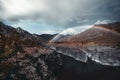 Double rainbow over a mountain river