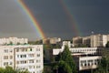 A double rainbow after the rain in the city Royalty Free Stock Photo