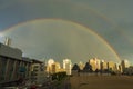 A double rainbow seen during a sunset over the Montreal skyline Royalty Free Stock Photo