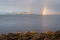 Double rainbows over islands in Norway.