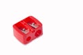 Double red plastic pencil sharpener - White background Royalty Free Stock Photo