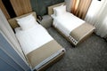 Bedroom in a hotel room with twin beds. Royalty Free Stock Photo