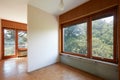 Double room interior with wooden floor in country house