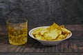 A double of Scotch or whiskey on Ice with chips