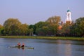 A double scull rows past Harvard University