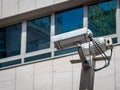 Double security camera in a building