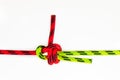 Double Sheet, becket bend or weaver`s hitch binding two colored red and green ropes. knot use for joining lines of