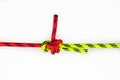 Double Sheet, becket bend or weaver`s hitch binding two colored red and green ropes. knot use for joining lines of