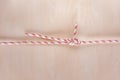 Double sheet bend ship knot on wooden background