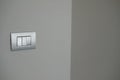 Double silver light switch on the wall Royalty Free Stock Photo