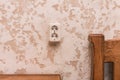 Double socket on a plaster wall in a modern room interior Royalty Free Stock Photo