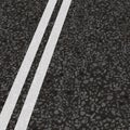 Double solid strip on road. Royalty Free Stock Photo