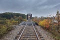 Double span riveted railway truss bridge built in 1893 crossing the Mississippi river in autumn in Galetta, Ontario, Canada