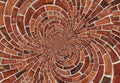Double spiral effect abstract red brick wall texture background. Arch arc mosaic bricks wall terracotta colors. Red bricks wall sp Royalty Free Stock Photo