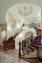 A double spiral staircase in the entry way of a custom home. Royalty Free Stock Photo