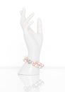 Double strand freshwater pearl bracelet on plastic mannequin female hand. Collection of luxury jewelry accessories. Studio shot