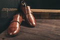 Double strap monk shoes on wooden table Royalty Free Stock Photo