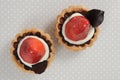 Double strawberry cupcake with chocolate leaf Royalty Free Stock Photo