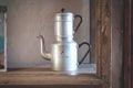 Double tea kettle pot vintage old kitchenware , Royalty Free Stock Photo