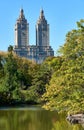 The double towers of the San Remo apartment building are seen across the Lake at Central Park, NYC Royalty Free Stock Photo