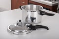 Double valve pressure cooker on white background