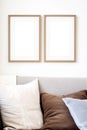 Double vertical picture frame with passe-partout mockup in home interior, blank copyspace, light tones, artwork mock-up. Royalty Free Stock Photo