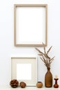 Double vertical picture frames with passe-partout mockup in modern interior, blank copyspace, light tones, wall art mock-up.