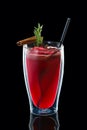 Double wall glass with hot strawberry and cinnamon drink