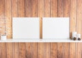 Double 8x10 Horizontal White Frame mockup with christmas decorations on white shelf and rustic wooden wall Royalty Free Stock Photo