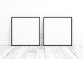 Double 10x10 Square Black Frame mockup on white wooden floor and white wall.