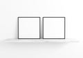 Double 10x10 Square Black Frame mockup on white wooden shelf and white wall.