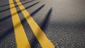 Double yellow lines on asphalt road with long shadows Royalty Free Stock Photo