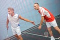 A doubles badminton game Royalty Free Stock Photo