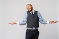 Doubt concept - Young african american businessman wearing tie and over light grey background clueless and confused Royalty Free Stock Photo