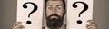Doubtful thinking man, looks for a solution. Expression of the human face. Beard man question mark, solution problems Royalty Free Stock Photo