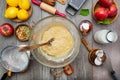 Dough for apple pie in a glass bowl. Ingredients for making sweet apple pie. View from above