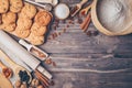 Baking background. Baking ingredients: flour, eggs, sugar, butter, milk and spices on rustic old table. Top view Royalty Free Stock Photo