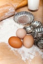 Dough baking ingredients, eggs, flour, milk and retro biscuit cutter