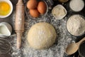 Dough for baking. making delicious cookies. Ingredients for the dough, eggs, flour, butter, sugar on a dark background. top view Royalty Free Stock Photo