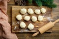 dough balls on wooden cutting board